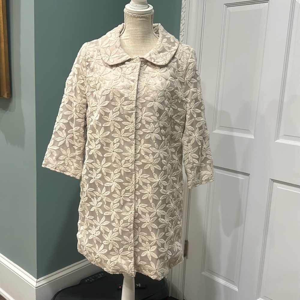 Luii longer length tan floral patterned jacket.  size is XL